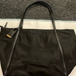 Tumi gently used travel tote.